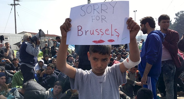 Les migrants solidaires avec Bruxelles